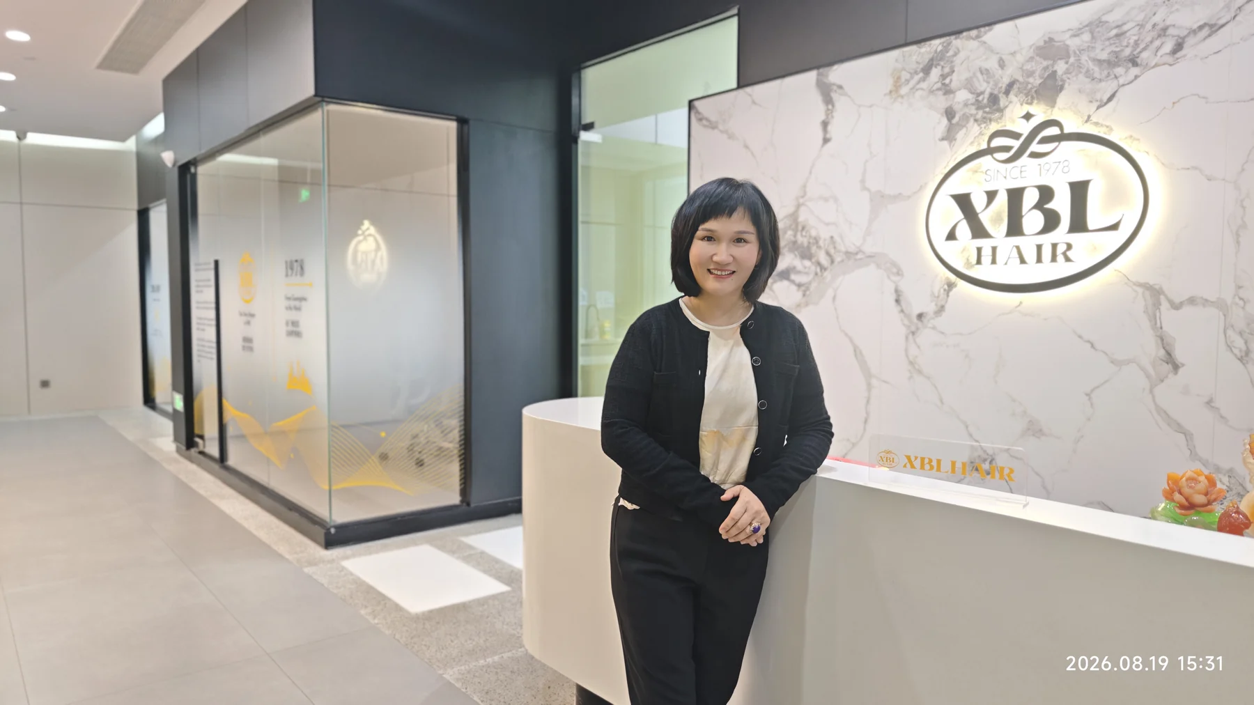 Mary, founder of XBL Hair, at the XBL Hair office